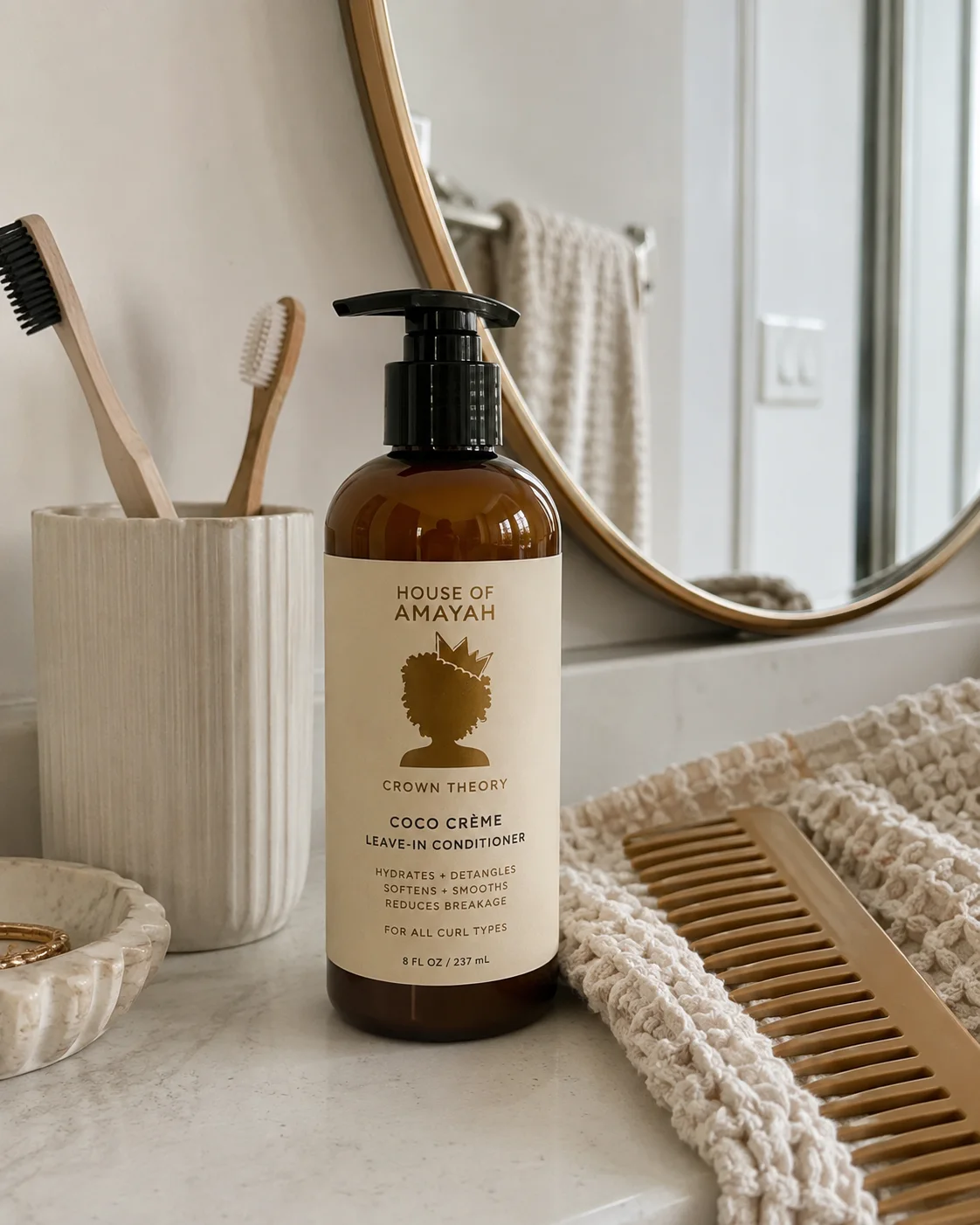 Crown Theory Coco Creme Leave-In Conditioner in a bathroom